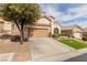 Attractive home boasting a neat front yard and a convenient two-car garage at 11237 Gallery Echo St, Las Vegas, NV 89141
