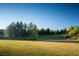 Expansive green space with mature trees, offering a serene and picturesque landscape at 11237 Gallery Echo St, Las Vegas, NV 89141