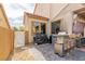 Outdoor kitchen with a built-in grill, bar seating, and ample counter space for entertaining at 11237 Gallery Echo St, Las Vegas, NV 89141