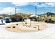 Interactive splash pad with colorful water features, providing a fun and refreshing play area at 11237 Gallery Echo St, Las Vegas, NV 89141