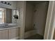 Bathroom with tub and vanity, offering essential amenities at 1150 N Buffalo Dr # 1015, Las Vegas, NV 89128