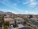 Scenic aerial view of the home, highlighting the neighborhood and mountain landscape at 11820 Calle De Sol Dr, Las Vegas, NV 89138