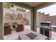 Patio with outdoor seating, including a fire pit and barbecue grill at 11820 Calle De Sol Dr, Las Vegas, NV 89138