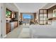 Well-appointed hotel room with a kitchenette, workspace, and balcony offering city vistas at 145 E Harmon Ave # 2917, Las Vegas, NV 89109