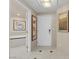Bright entryway with a view of the bath area featuring a tub at 145 E Harmon Ave # 2917, Las Vegas, NV 89109