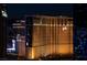 Exterior nighttime view of a brightly lit Las Vegas hotel with its distinctive architecture at 145 E Harmon Ave # 2917, Las Vegas, NV 89109