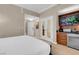 Bright main bedroom with kitchenette and doorway to the hallway at 145 E Harmon Ave # 2917, Las Vegas, NV 89109
