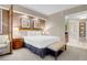 Bright main bedroom with neutral decor and ensuite bathroom at 145 E Harmon Ave # 2917, Las Vegas, NV 89109