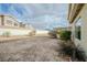 Backyard with desert landscaping and covered patio at 172 Cloudcrest Dr, Henderson, NV 89015