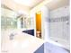 Modern bathroom features a double vanity, walk-in shower, and bright tile at 172 Cloudcrest Dr, Henderson, NV 89015