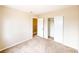 Bedroom featuring neutral paint, carpet, closet and entry doors at 172 Cloudcrest Dr, Henderson, NV 89015