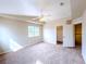 Bright bedroom with neutral walls, carpet, a ceiling fan and a closet at 172 Cloudcrest Dr, Henderson, NV 89015