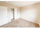 Bedroom featuring neutral paint, carpet and a closet with sliding doors at 172 Cloudcrest Dr, Henderson, NV 89015