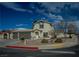Charming home featuring a two-car garage with a spacious driveway and simple desert landscaping at 172 Cloudcrest Dr, Henderson, NV 89015