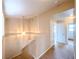 Hallway featuring neutral paint, carpet, and staircase with an overhead light at 172 Cloudcrest Dr, Henderson, NV 89015