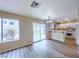 Bright kitchen and dining area with sliding glass doors to backyard patio at 172 Cloudcrest Dr, Henderson, NV 89015