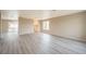 Spacious living room featuring modern light gray flooring, neutral walls, and bright, airy lighting at 172 Cloudcrest Dr, Henderson, NV 89015