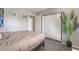 Bedroom with full size bed, closet, and natural lighting at 212 N Torrey Pines Dr, Las Vegas, NV 89107