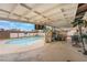The backyard pool features a basketball hoop and is perfect for summer fun! at 212 N Torrey Pines Dr, Las Vegas, NV 89107