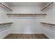 Walk-in closet with modern shelving and ample storage space at 2120 Maple Springs St, Henderson, NV 89002