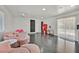 Stylish bedroom with trendy decor, sliding glass door, and sleek hardwood floors, perfect for relaxation and privacy at 2221 Mohawk St, Las Vegas, NV 89146