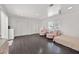 Cozy bedroom featuring hardwood floors, dual closets, and bright windows, creating a serene atmosphere at 2221 Mohawk St, Las Vegas, NV 89146