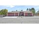 Charming single-story home featuring a well-maintained front yard, a two-car garage and a welcoming entryway at 2221 Mohawk St, Las Vegas, NV 89146