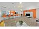 Bright living room showcasing open layout, breakfast bar seating, and seamless connection to the kitchen area at 2221 Mohawk St, Las Vegas, NV 89146