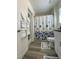 Bathroom featuring white vanity, modern fixtures, decorative shower curtain, and tile floors at 2775 Atomic Tangerine Way # 4, Las Vegas, NV 89183