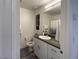 Clean bathroom with white vanity, modern fixtures, and a shower-tub combo at 2775 Atomic Tangerine Way # 4, Las Vegas, NV 89183