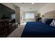 Spacious bedroom featuring neutral carpet, light walls, and a comfortable king-size bed at 2775 Atomic Tangerine Way # 4, Las Vegas, NV 89183