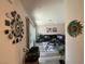 Open-concept living room with modern decor, plush sofa, and sliding glass doors for natural light at 2775 Atomic Tangerine Way # 4, Las Vegas, NV 89183
