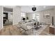 Comfortable living room offering seamless flow to the dining area and backyard at 3916 S Torrey Pines Dr, Las Vegas, NV 89103