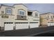Inviting two-story condo with a well-maintained facade and attached garages at 3936 Pepper Thorn Ave # 102, North Las Vegas, NV 89081
