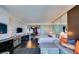 Spacious and well-lit suite with a comfortable sectional sofa, modern furnishings, and a seamless kitchen view at 4381 W Flamingo Rd # 1510, Las Vegas, NV 89103