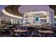 Gaming area with poker tables and comfortable seating in an expansive space at 4381 W Flamingo Rd # 1510, Las Vegas, NV 89103