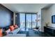 Contemporary living room showcasing a comfortable sofa, city views, and a sleek glass coffee table, perfect for relaxing at 4381 W Flamingo Rd # 1510, Las Vegas, NV 89103