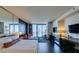 Open bedroom layout with a workspace and balcony, offering beautiful city views at 4381 W Flamingo Rd # 1510, Las Vegas, NV 89103