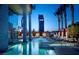 Hotel pool with lounge chairs at 4381 W Flamingo Rd # 1510, Las Vegas, NV 89103
