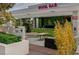 Stylish pool bar with modern design, ample seating, and lush greenery at 4381 W Flamingo Rd # 1510, Las Vegas, NV 89103