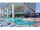 Luxury pool area with swim-up platforms, lounge chairs, and stunning hotel views at 4381 W Flamingo Rd # 1510, Las Vegas, NV 89103