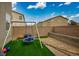 Spacious backyard featuring a swing set and gravel at 4606 Engage St, North Las Vegas, NV 89031