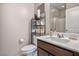 Bathroom with a clean white sink, white toilet, and neutral wall color at 4606 Engage St, North Las Vegas, NV 89031
