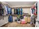 Walk-in closet with clothing racks and storage space at 4606 Engage St, North Las Vegas, NV 89031