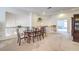Charming dining room is adjacent to the upper living area with decorative railing at 4679 El Camino Cabos Dr, Las Vegas, NV 89147