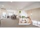 Open living area with railing overlooking the downstairs and neutral carpeting at 4679 El Camino Cabos Dr, Las Vegas, NV 89147