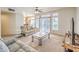 Spacious living room with vaulted ceilings and lots of natural light at 4679 El Camino Cabos Dr, Las Vegas, NV 89147