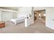 Spacious main bedroom features double closets and neutral colored carpet at 4679 El Camino Cabos Dr, Las Vegas, NV 89147