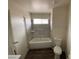Bathroom featuring a shower over tub with modern tile surround at 4843 Lana Dr, Las Vegas, NV 89121