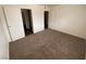 Empty carpeted bedroom with double closet at 4843 Lana Dr, Las Vegas, NV 89121